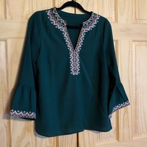 Beautiful hunter green top with embroidered trim